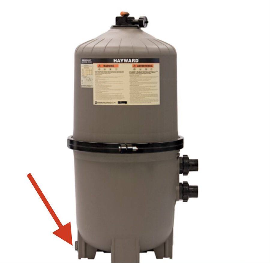 Cartridge filter with drain plug marked by arrow